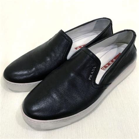 prada black slip on shoes.